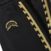 A.I.9 AFRICAN INTELLIGENCE PATH TO THE FUTURE II - PANTALONES DE CHÁNDAL DE LA COLABORACIÓN CON SANDFLOWER