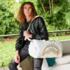 BOLSA DE DEPORTE RIVIERA LE BLANC CON CADENA DORADA Y DETALLE DE TIBURÓN