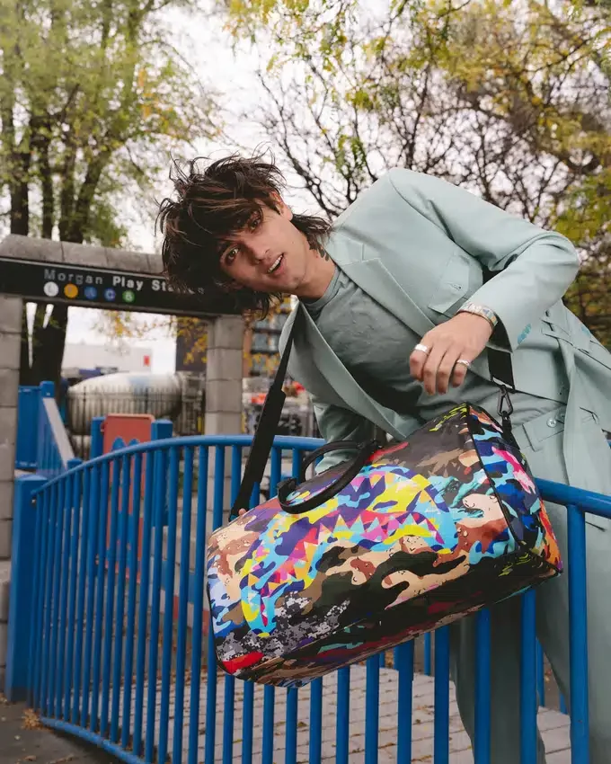 BOLSA DE VIAJE CON ESTAMPADO DE CAMO