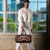BOLSA DE VIAJE SHARKS IN PARIS GRIN & GRIND