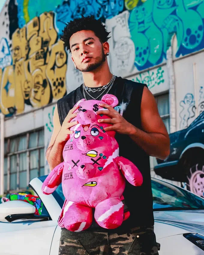 Mochila de peluche con osito de tres cabezas
