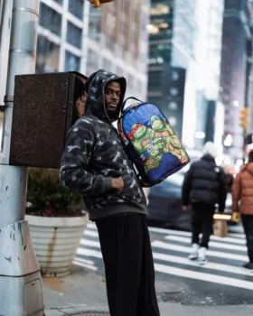 Mochila DLXSR «TAPA DE ALCANTARILLA» DE LAS TORTUGAS NINJA