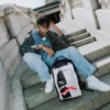 Mochila «Sharks in Paris» con ilusión óptica de «Bolsa sobre bolsa»