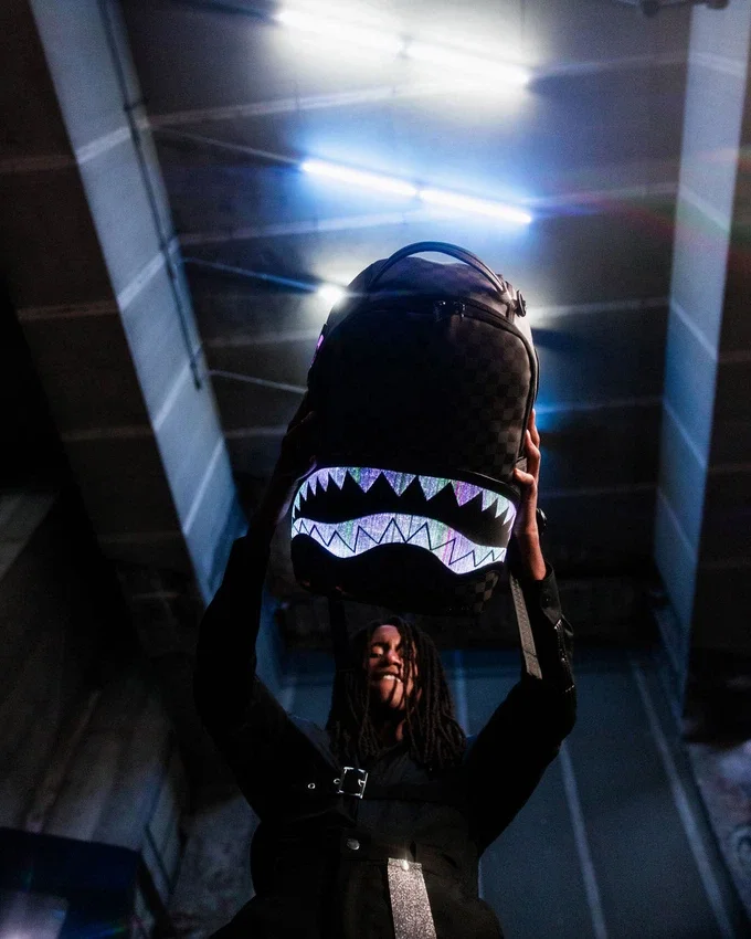 SHARK OPTICS - LA Mochila con espectáculo de luces
